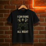 Black t-shirt with graphic design and text 'I Can Bang All Night' on a brick wall background