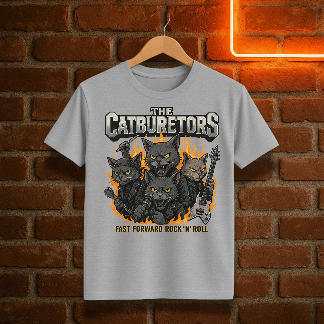 Gray t-shirt with cat-themed design and text 'The Catburetors Fast Forward Rock 'N' Roll' on a brick wall background.