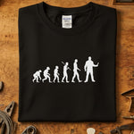 Evolution of Man mekaniker t-skjorte, svart med hvitt design, perfekt for mekanikeren og hverdagsbruk.