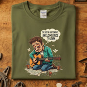 I've Got a Gig Tonight T-Skjorte med illustrasjon av en musiker som øver på gitar.