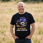 En mann smilende i en 