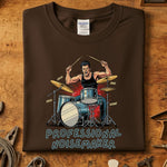 Professional Noisemaker T-Skjorte featuring a drummer illustration on a brown Gildan shirt.