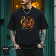 Rock & Rooster T-Skjorte featuring a guitarist and rooster graphic on a black shirt.