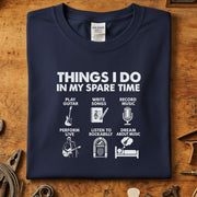 Things I do in my spare time Rockabilly T-skjorte with music-themed graphics on a navy shirt.
